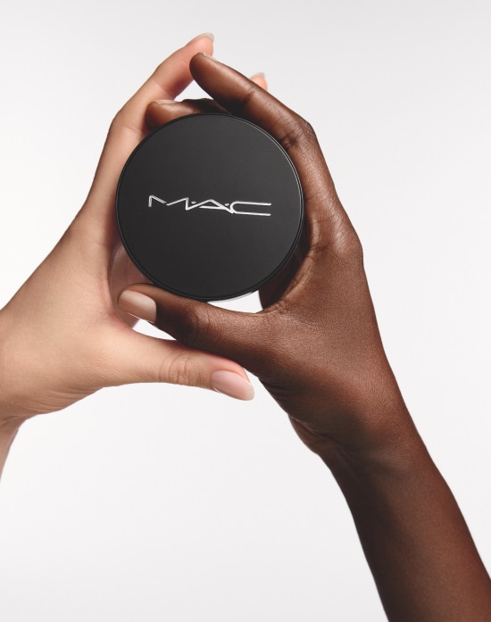 Closeup of model applying our iconic Velvet Teddy Matte Lipstick