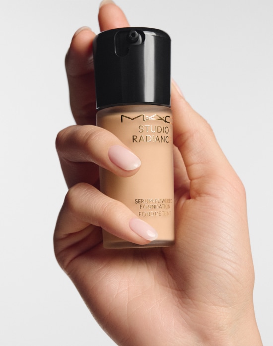 Closeup of model applying our iconic Velvet Teddy Matte Lipstick