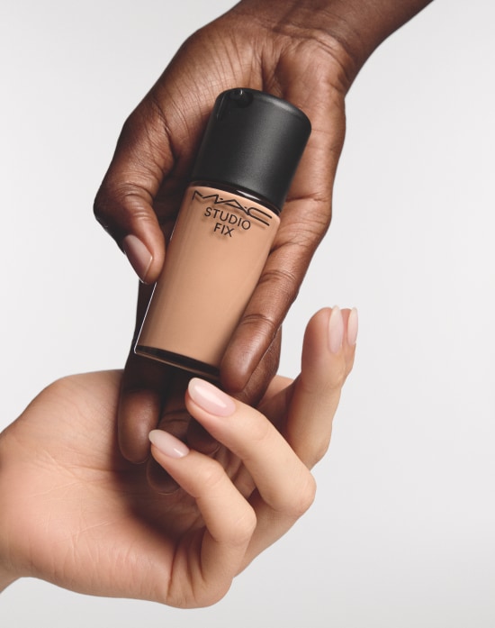 Closeup of model applying our iconic Velvet Teddy Matte Lipstick